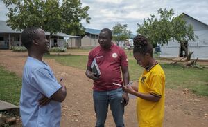 GIZ ESDS colleagues and health center personnel during a review of the energy infrastructure at the facility.