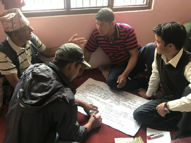 SN013 Representative-of-Nishi-Khola-II-MHP-discussing-to-prepare-SWOT-analysis-of-their-MHP-800x600.png