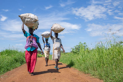 Women carry charcoal-SouthSudan-FAO Glinski.jpg