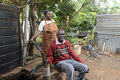 Water Tank in Kenya with man and woman.jpg