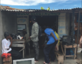 Informal repair shop in a refugge camp.png