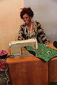 Tailor with electric sowing machine.JPG
