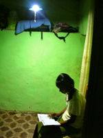 Girl reading with PicoPV system.JPG